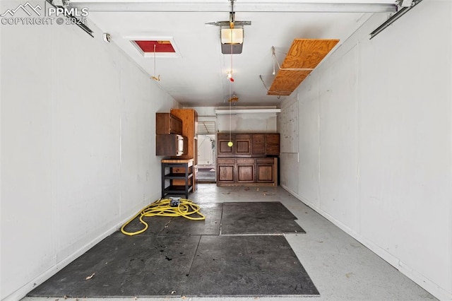 garage featuring a garage door opener