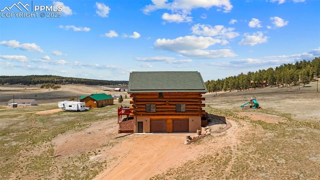 654 High Pasture Rd, Florissant, CO 80816 - view of outbuilding featuring dirt driveway and an attached garage