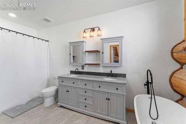 654 High Pasture Rd, Florissant, CO 80816 - full bathroom with a freestanding bath, double vanity, toilet, and a shower with curtain