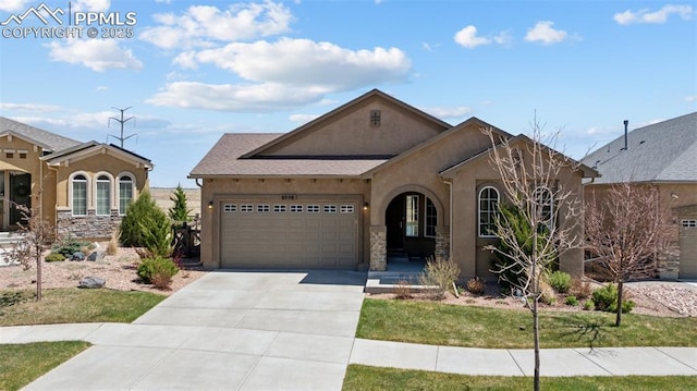 ranch-style house featuring a garage, driveway, and stucco siding