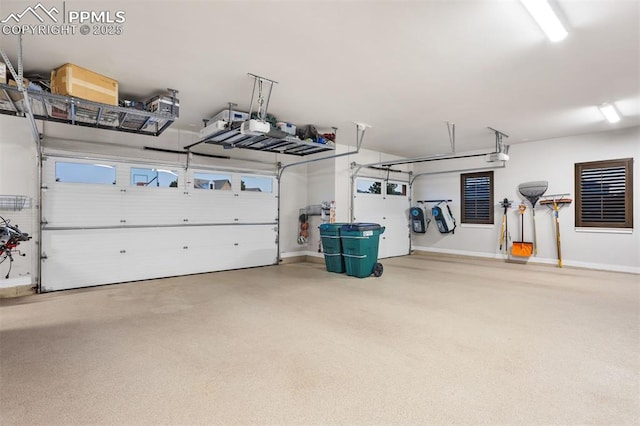 4043 Needles Dr, Colorado Springs, CO 80908 - garage with baseboards and a garage door opener