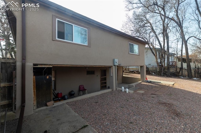 710 S Royer St, Colorado Springs, CO 80903 - back of house featuring fence, a patio, and stucco siding