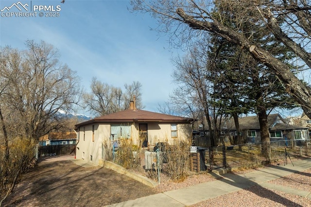 710 S Royer St, Colorado Springs, CO 80903 - view of front of house with fence private yard and stucco siding