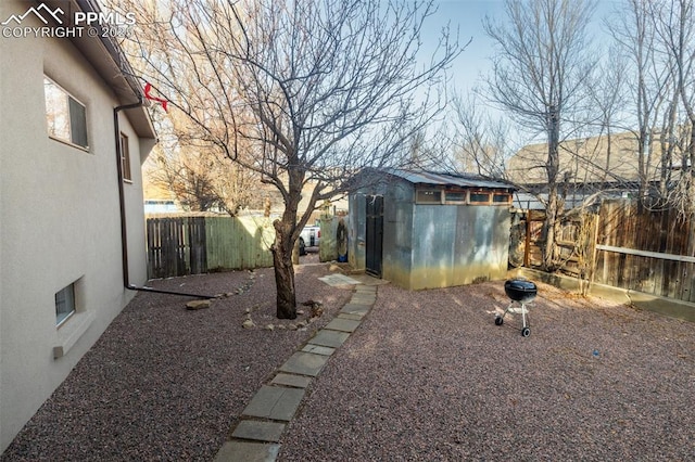 710 S Royer St, Colorado Springs, CO 80903 - view of yard with a fenced backyard, an outbuilding, and a shed