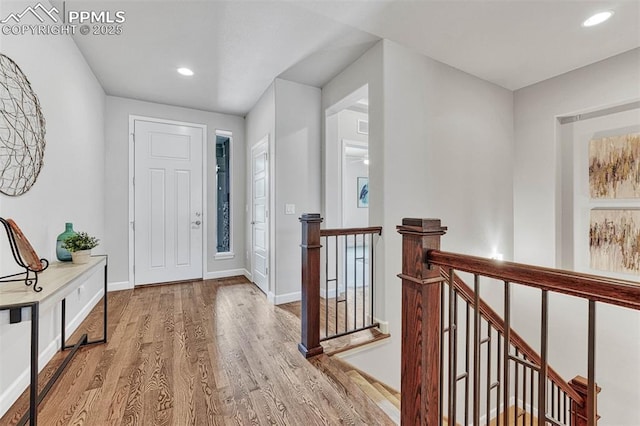 4464 Portillo Pl, Colorado Springs, CO 80924 - entryway with recessed lighting, wood finished floors, and baseboards