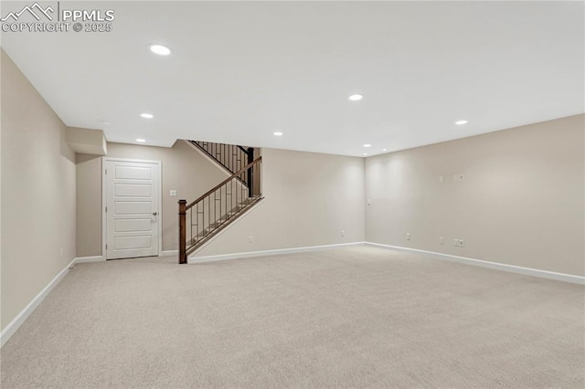 4464 Portillo Pl, Colorado Springs, CO 80924 - finished below grade area with recessed lighting, stairs, light carpet, and baseboards