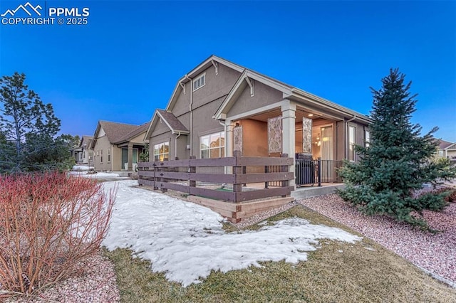 4464 Portillo Pl, Colorado Springs, CO 80924 - craftsman house with stucco siding