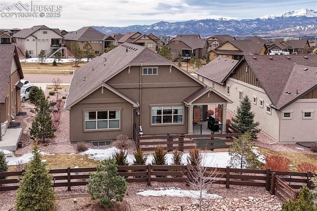 4464 Portillo Pl, Colorado Springs, CO 80924 - back of property featuring a fenced backyard, stucco siding, and a residential view