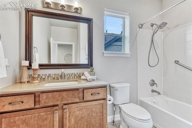 4464 Portillo Pl, Colorado Springs, CO 80924 - bathroom featuring vanity, toilet, bathtub / shower combination, and baseboards