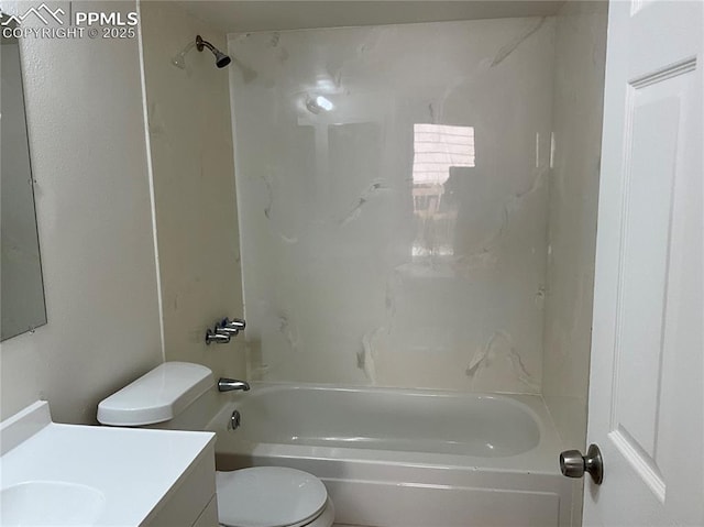 720 E Hills Rd, Colorado Springs, CO 80909 - bathroom featuring toilet, vanity, and bathing tub / shower combination