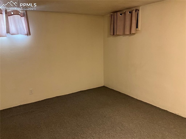 1007 Iowa Ave, Colorado Springs, CO 80909 - unfurnished room featuring dark carpet
