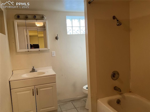 1007 Iowa Ave, Colorado Springs, CO 80909 - full bath featuring shower / bathing tub combination, vanity, tile patterned flooring, and toilet