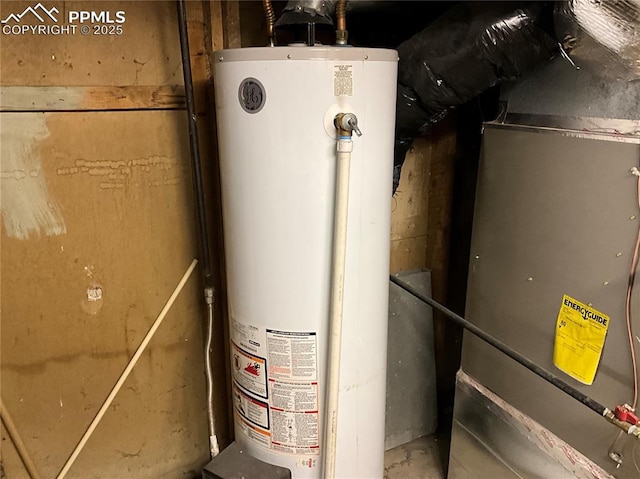1007 Iowa Ave, Colorado Springs, CO 80909 - utility room with water heater and heating unit