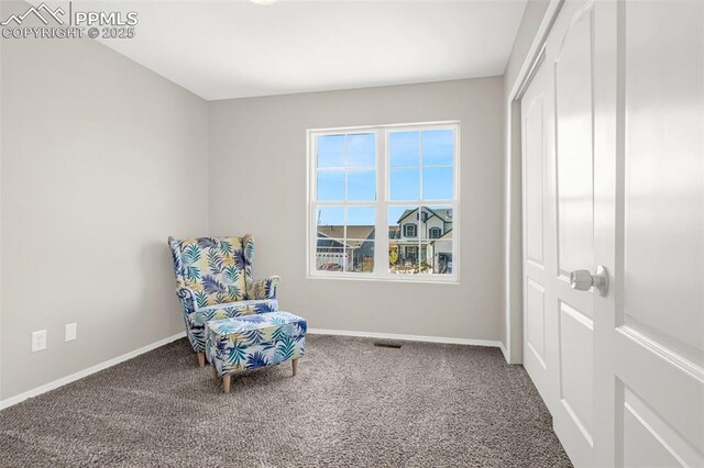 2261 Springside Dr, Colorado Springs, CO 80951 - living area featuring carpet floors and baseboards