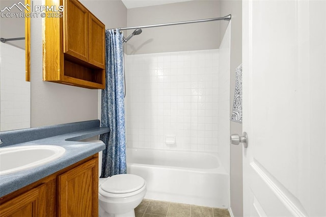 2261 Springside Dr, Colorado Springs, CO 80951 - bathroom featuring vanity, shower / bath combination with curtain, and toilet