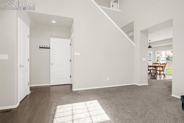 2261 Springside Dr, Colorado Springs, CO 80951 - interior space featuring stairs, recessed lighting, baseboards, wood finished floors, and visible vents