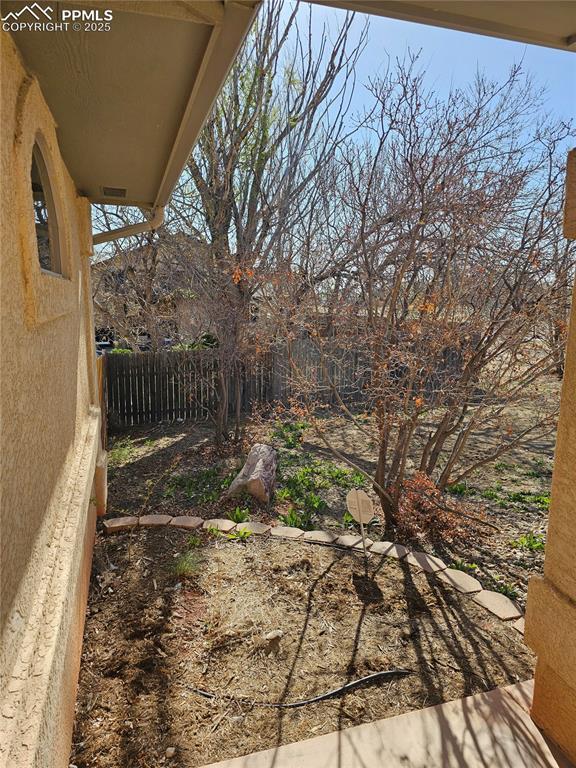 view of yard featuring fence