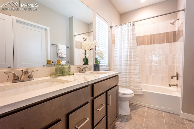 bathroom featuring toilet, shower / tub combo, double vanity, and tile patterned flooring