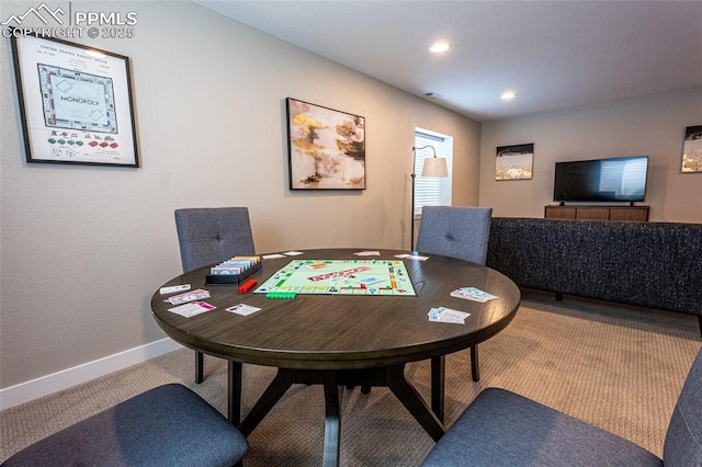dining room with carpet, baseboards, and recessed lighting