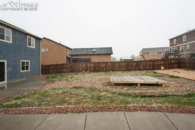 view of yard featuring a fenced backyard