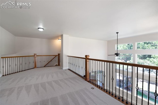 7436 Centennial Glen Dr, Colorado Springs, CO 80919 - hall featuring baseboards, carpet flooring, and a wealth of natural light