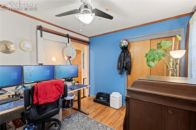 1514 Howard Ave, Colorado Springs, CO 80909 - office with ceiling fan, baseboards, crown molding, and wood finished floors
