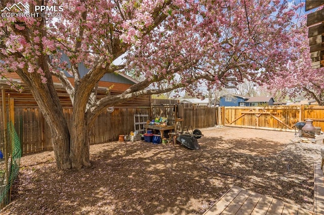 1514 Howard Ave, Colorado Springs, CO 80909 - view of yard with a fenced backyard