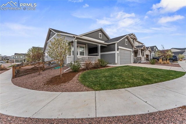 craftsman-style house with a porch, a front lawn, an attached garage, and a residential view