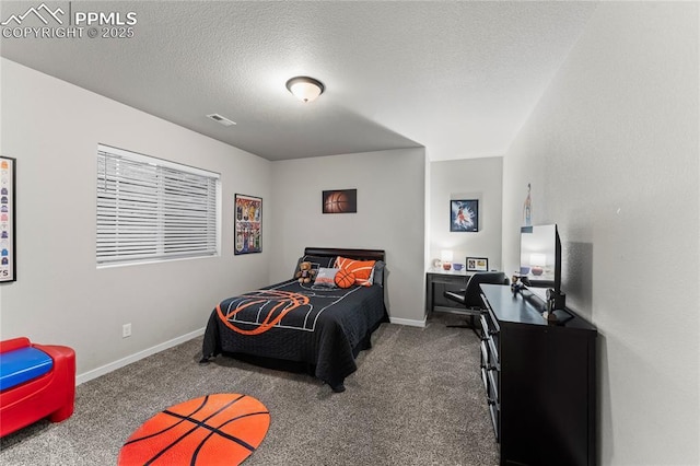 carpeted bedroom with a textured ceiling, visible vents, and baseboards