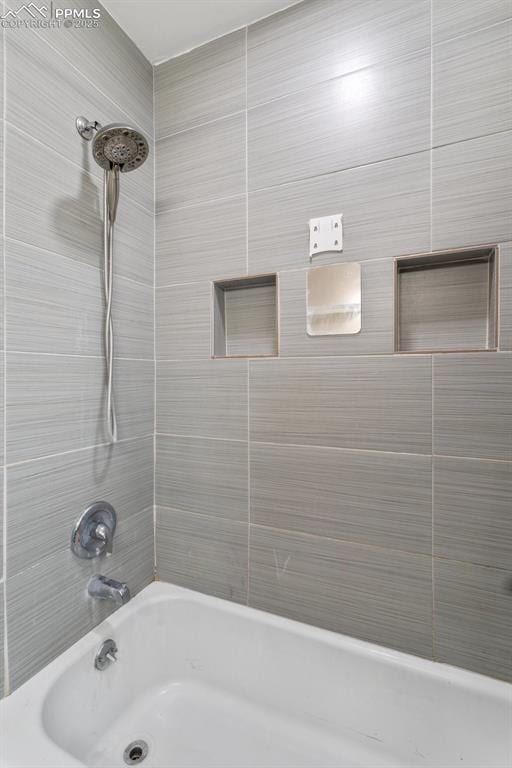 full bathroom with bathing tub / shower combination