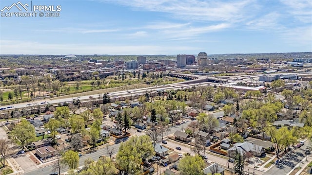 drone / aerial view featuring a city view