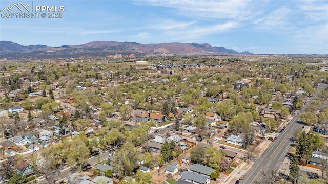 drone / aerial view with a mountain view and a residential view