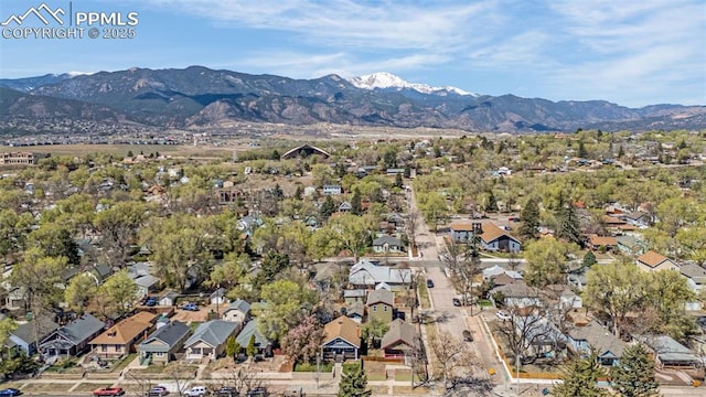 drone / aerial view featuring a mountain view and a residential view