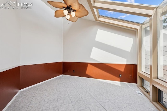 70 Palm Springs Dr, Colorado Springs, CO 80921 - spare room with a skylight, ceiling fan, and baseboards