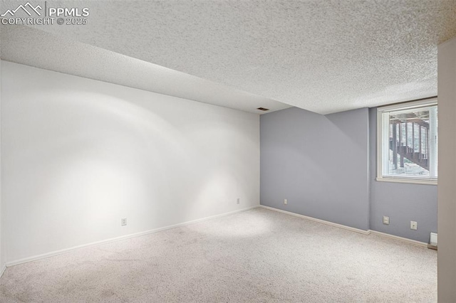 70 Palm Springs Dr, Colorado Springs, CO 80921 - carpeted empty room with a textured ceiling and baseboards