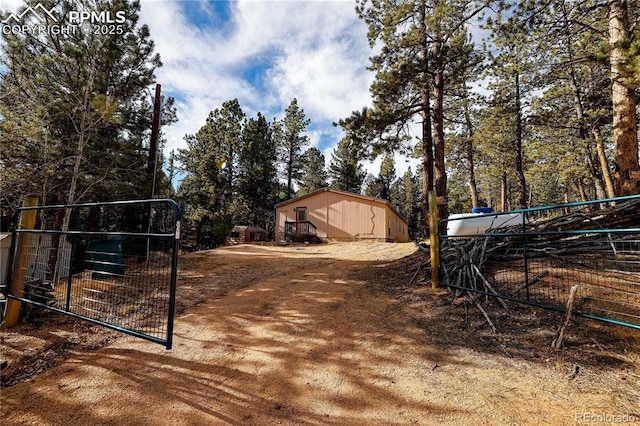 view of yard featuring a gate and fence
