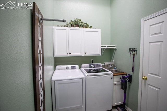laundry area with cabinet space and washer and dryer
