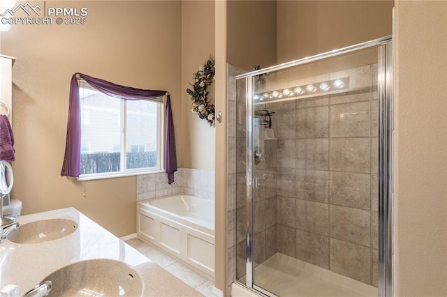 full bath with a sink, a shower stall, a garden tub, and tile patterned flooring