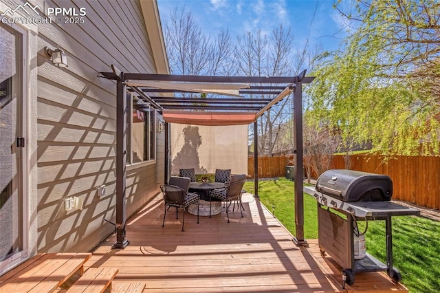 wooden terrace featuring a pergola, a fenced backyard, a yard, grilling area, and outdoor dining area