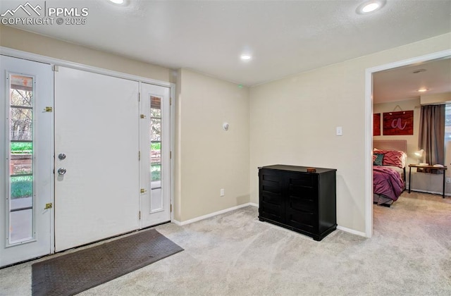8716 Chipita Park Rd, Cascade, CO 80819 - entryway with plenty of natural light, carpet flooring, recessed lighting, and baseboards