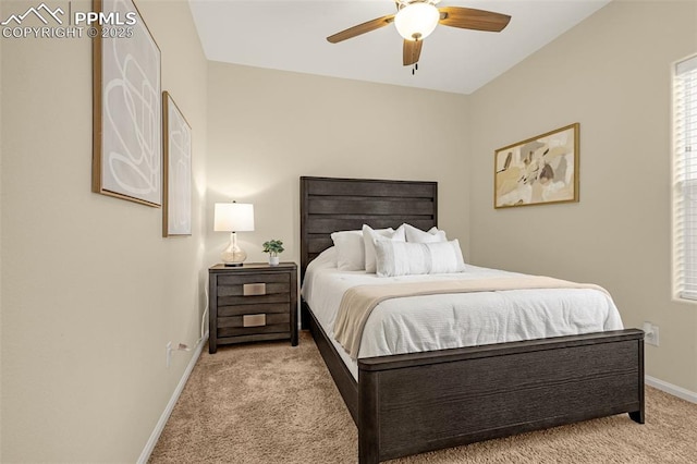 bedroom with light carpet, a ceiling fan, and baseboards