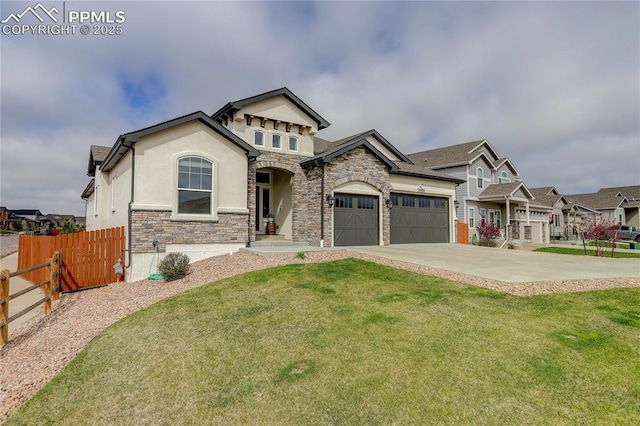 craftsman inspired home featuring a garage, fence, a front lawn, concrete driveway, and stucco siding