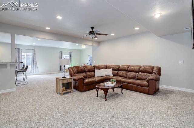 living area featuring visible vents, a ceiling fan, baseboards, recessed lighting, and carpet flooring