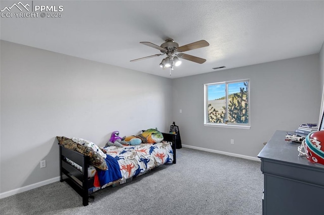 15930 Alta Plaza Cir, Peyton, CO 80831 - carpeted bedroom with baseboards and a ceiling fan