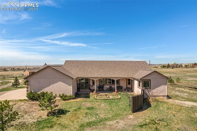 15930 Alta Plaza Cir, Peyton, CO 80831 - ranch-style house featuring a front lawn, a porch, and stucco siding