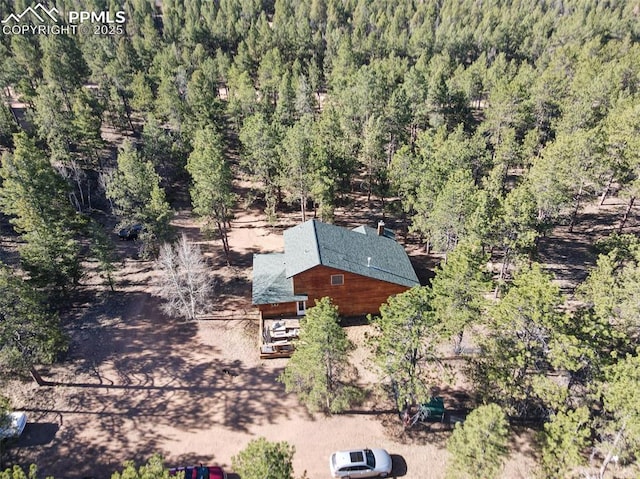 drone / aerial view with a view of trees