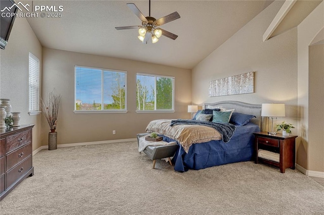 9539 Lizard Rock Trl, Colorado Springs, CO 80924 - carpeted bedroom featuring baseboards, multiple windows, a ceiling fan, and lofted ceiling
