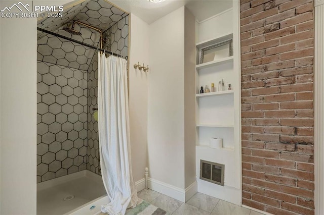 519 W Bijou St, Colorado Springs, CO 80905 - full bathroom featuring baseboards, visible vents, a stall shower, and tile patterned floors
