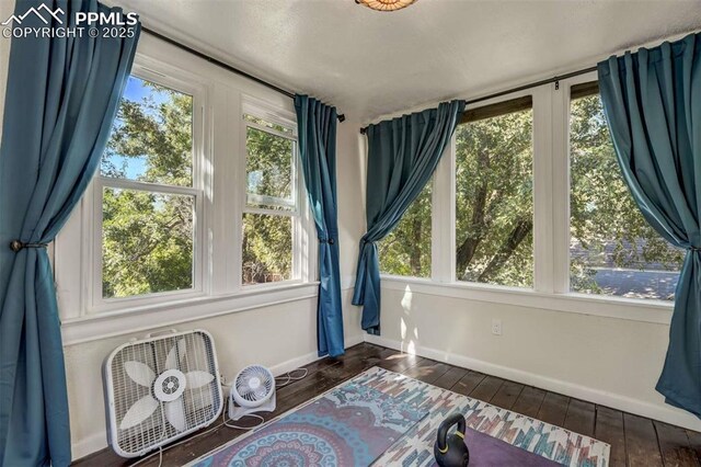 519 W Bijou St, Colorado Springs, CO 80905 - interior space with hardwood / wood-style floors and baseboards