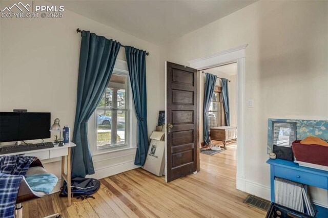 519 W Bijou St, Colorado Springs, CO 80905 - home office featuring light wood-style floors, visible vents, and baseboards